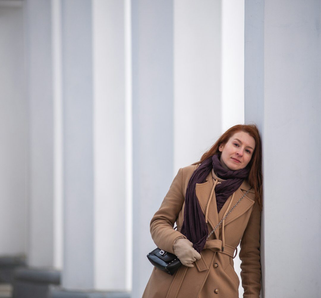 Professional Australian woman journalist in navy blazer